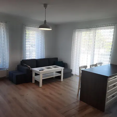 Za świerkami Apartament *